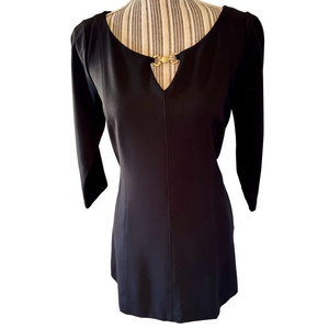 White House Black Market mini dress in black with gold tone accents size medium